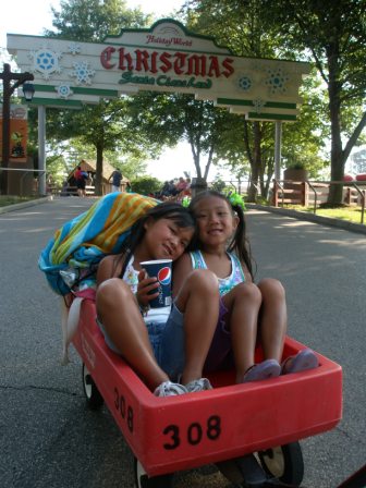 Kasen and Mia riding in the wagon